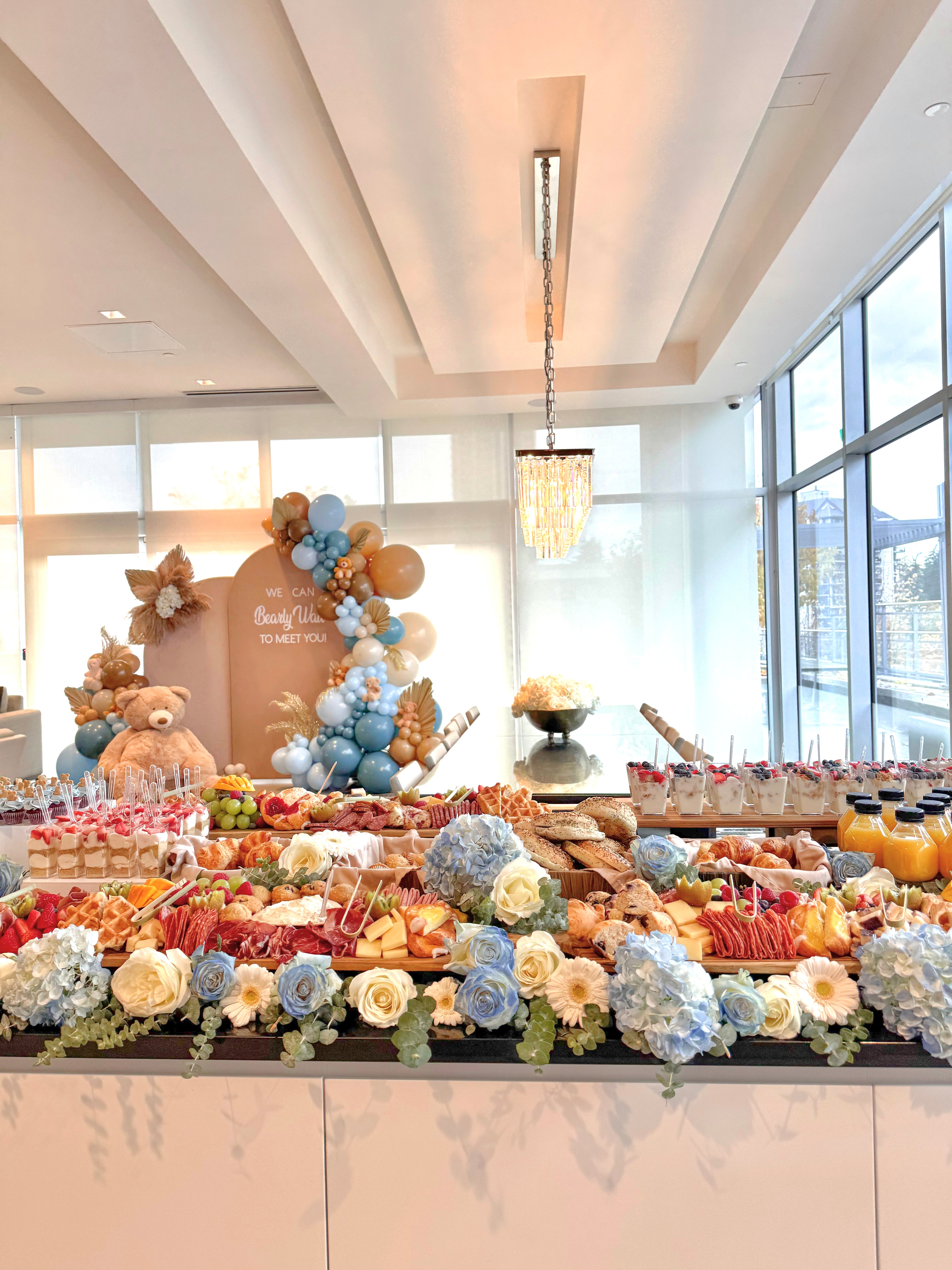 baby shower grazing table and desserts catering setup